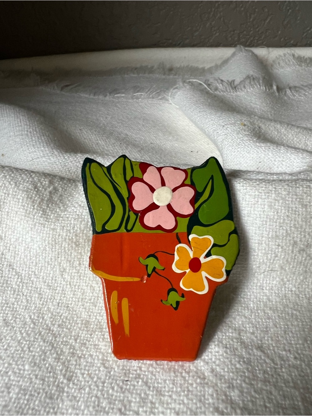 handmade floral magnet, hand-painted with a vibrant folk-art style.